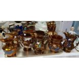 A Victorian collection of 10 large copper lustre jugs