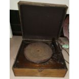 An early electric table top record player by HMV (sold as a collectors item only)