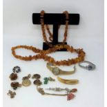 Reconstituted amber beads, Seiko automatic lady's watch etc