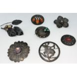 A selection of Art Nouveau / Celtic style white metal brooches