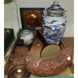 A selection of oriental carved wooden items, ceramic ginger jar etc
