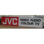 An illuminated sign JVC