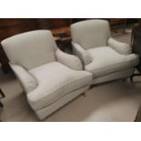 A Victorian style pair of armchairs in cream loose weave fabric