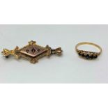 A 9 carat hallmarked gold dress ring, the Victorian style split shank set 5 graduating sapphire