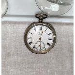An oval faced key wound gent's pocket watch in engine turned silver case