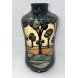 A modern Moorcroft vase of cylindrical waisted form, decorated with landscape and trees by Sian