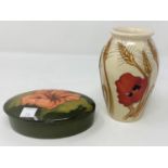 A Moorcroft baluster vase decorated with red poppy and barley, impressed and with original label,
