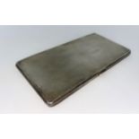 A rectangular engine turned hall marked silver cigarette case internal monogram London 1933 8.3oz (