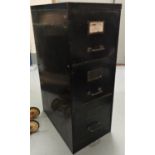 A vintage 3 height metal filing cabinet