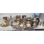A silver plated oval gallery tray; a silver plated 3 piece tea set with Celtic border; other