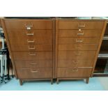 A 1960's pair of walnut 6 height chests of drawers