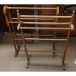 Two lightwood towel rails in the Edwardian style