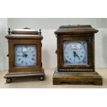 A stained wood bracket clock/cabinet in the Georgian style; a similar clock