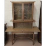 A modern Ercol full height display cabinet, 'Silver Mist', with double glazed cupboards over