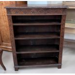 A Victorian carved oak 4 height bookcase
