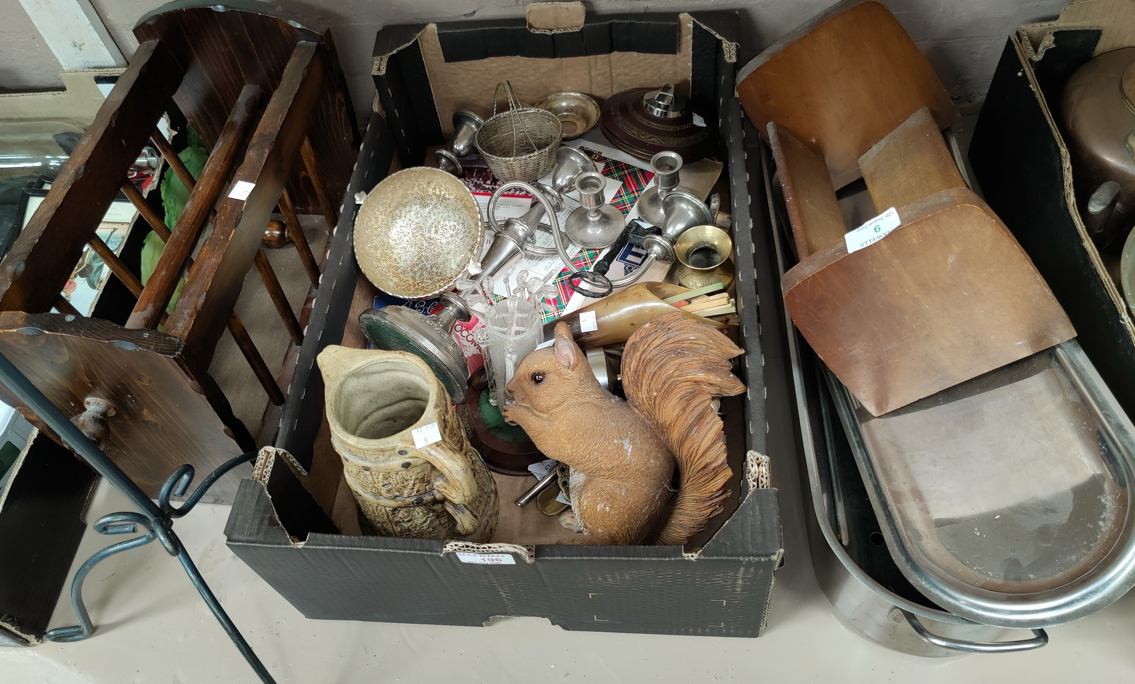 A floor standing candelabrum in wrought metal; 2 bookracks; decorative items and bric-a-brac