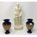 A Staffordshire figure King Edward VII; a pair of Slaters Patent stoneware vases by Royal Doulton,