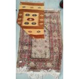 A 20th century Turkish prayer rug, hand knotted, 130 x 98 cm; a small flat woven kilim