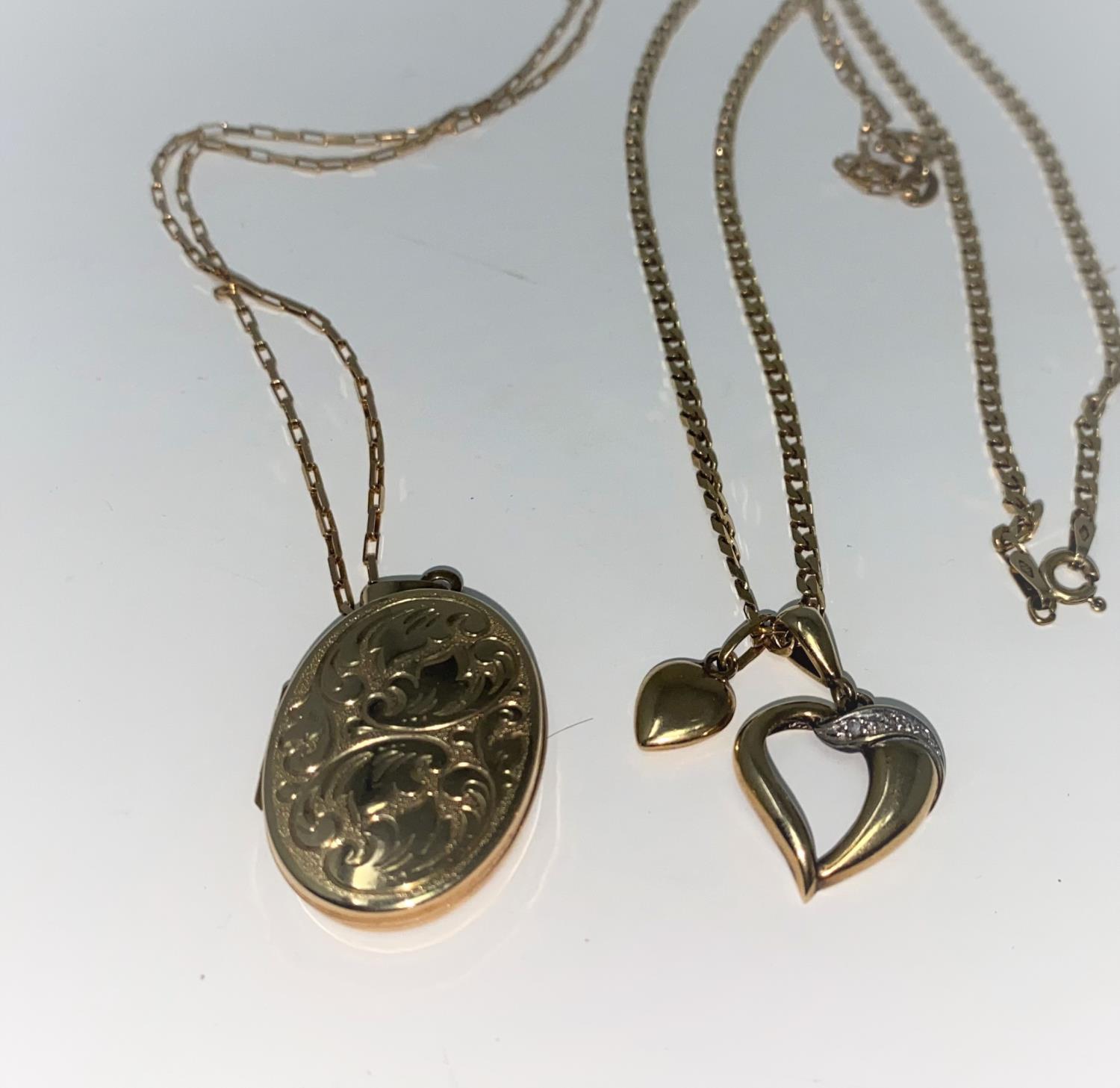 An oval locket and chain, both stamped '375'; a heard pendant stamped '9ct'; a flattened chain