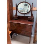 An Edwardian inlaid mahogany dressing table of 2 long, 2 short and 2 jewellery drawers