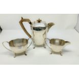 An Art Deco hall marked silver coffee set of canted rectangular tapering design with beaded rim