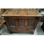 An oak Jacobean style bedding chest with hinged lid and single drawer, length 83 cm