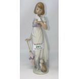 A Lladro Collectors Society figure: woman with umbrella, boxed