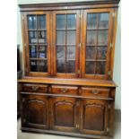 A distressed oak library bookcase IN THE STYLE OF Titchmarsh & Goodwin in the Georgian style, the u