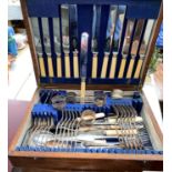 An oak cased part canteen of cutlery; other cutlery