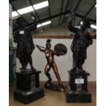 A 19th century pair of bronzed spelter figures: men in renaissance dress on marble plinths, height