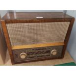 A 1950's Ekco radio in walnut case