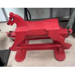 A c 1950's / 60's red child's small rocking horse