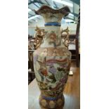 A large Japanese vase with flared rim decorated with birds, on wooden stand, height 60 cm