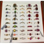 Fifty white metal/plated decorative dress rings set coloured stones, mostly stamped '925'