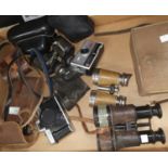 A selection of vintage cameras and binoculars