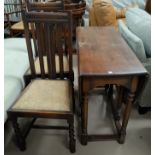 A 1930's oak dining table with oval drop leaf top; a set of 4 barley twist dining chairs
