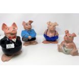 A NatWest money box Wade pig family: father, mother, son and baby