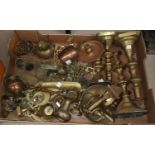A selection of pairs of brass candlesticks and other decorative brassware including a Victorian