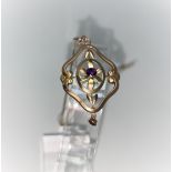 An Edwardian style pendant set amethyst, stamped '9ct', on fine chain