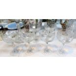 A set of 6 cut crystal coupe glasses; a similar decanter