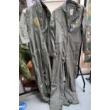 Two American military coveralls, patches removed, one with seven double bar to shoulder (one arm cut
