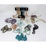 A selection of costume necklaces, various colours and stones etc