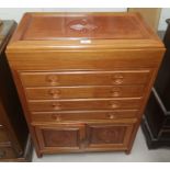 A modern 20th century Chinese cabinet for jade collectors, with hinged top, 4 drawers and double
