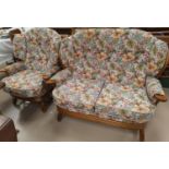 A modern 2 seater settee, Ercol style with stick back, 2 similar armchairs with floral upholstery