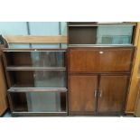 A 1960's walnut sectional secretaire cabinet and matching bookcase