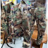 Two military camouflage jackets, one with USA flag patch to arm and a pair of chemical suit military