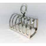 An Arched six division hall marked silver toast rack London 1937 4.3oz (133gms) by Charles Boynton