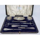 A cased hall marked silver 9 piece engine turned manicure set Birmingham 1925