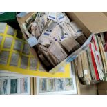 A large collection of cigarette and tea cards, in frames, albums and loose