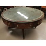 A Bevan & Funnell "Reprodux" mahogany coffee table in the Regency style with circular drum shaped